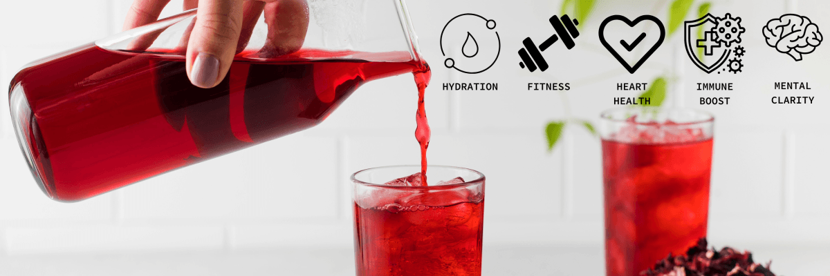 Red iced tea being poured from a glass pitcher into an ice-filled glass, with wellness icons highlighting hydration, fitness, heart health, immune boost, and mental clarity.