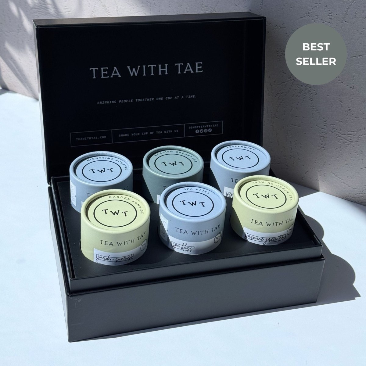 Image of the Tea with Tae Bento Box labeled “Best Seller,” featuring a black gift box with six assorted tea tubes.